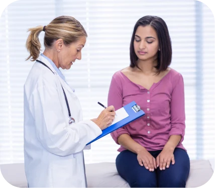 Orthopedic doctor evaluating a patient’s knee to determine if a meniscus tear is repairable or requires meniscectomy