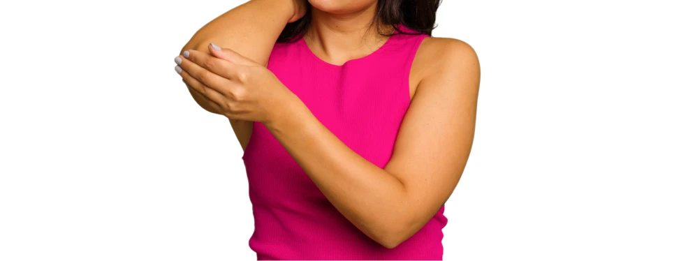 Woman holding her elbow due to pain, illustrating symptoms of chronic lateral epicondylitis or tennis elbow