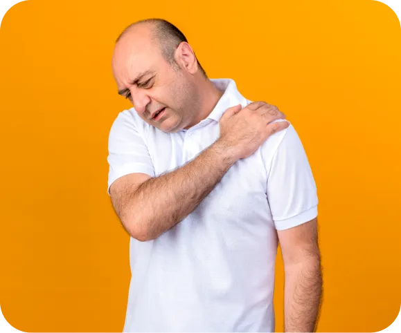 Adult male holding his shoulder with visible pain, showing symptoms consistent with biceps tendon medial subluxation or dislocation