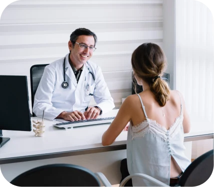 Doctor evaluating a patient with knee pain during ACL tear consultation and diagnosis