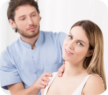 Doctor evaluating a patient’s shoulder for pain, weakness, and signs of a posterior labral tear