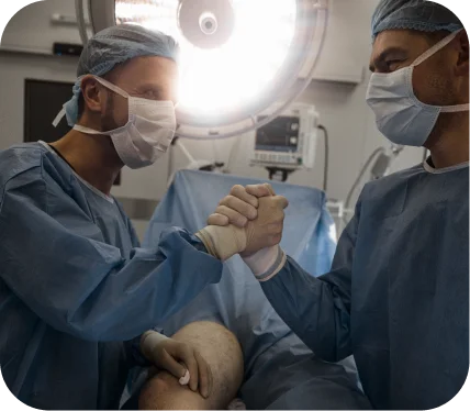 Surgeons performing advanced meniscus repair using modern techniques like the circumferential compression stitch during knee surgery