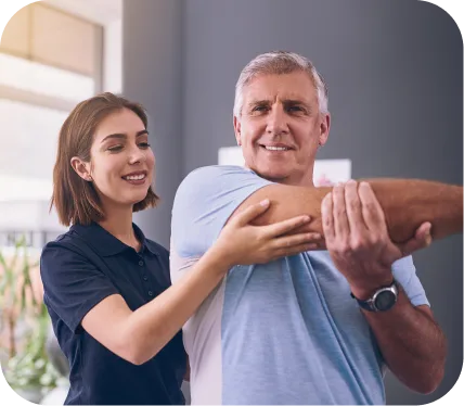 Man receiving physical therapy for shoulder pain to improve mobility and recover shoulder function