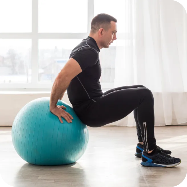 man performing shoulder stability exercise using fitness ball to prevent labral tears and joint instability
